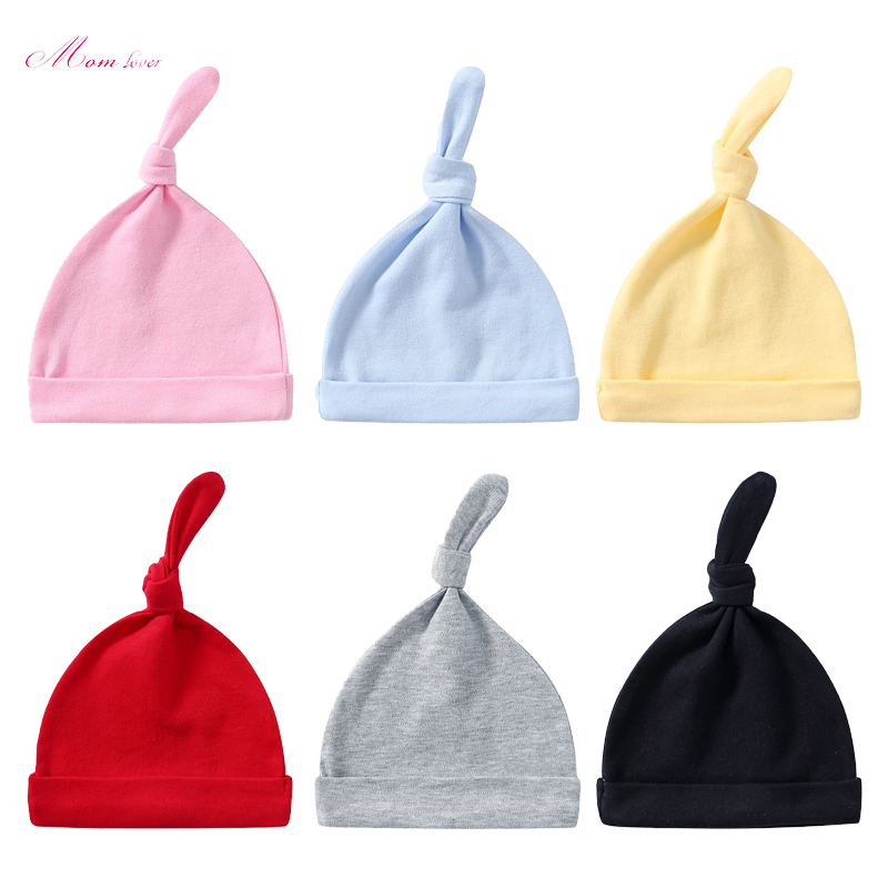 Infans solidum color bombacio knitted hat